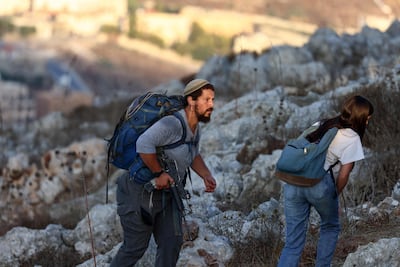 Israeli settlers take part in a march near Nablus, in the occupied West Bank. AFP