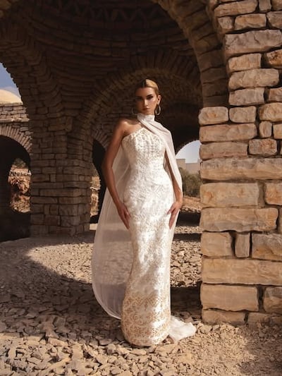 The dress by Jordanian-Palestinian designer Reema Dahbour, as worn by Bella Hadid at the launch party for her perfume brand in UAE. Reema Dahbour / Instagram