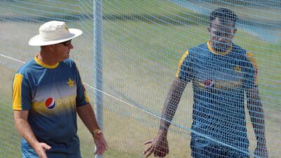 Pakistan head coach Mickey Arthur, left, and Pakistan bowler Wahab Riaz during a practice session at the Sharjah Cricket Stadium. Aamir Qureshi / AFP