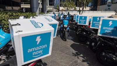 Amazon Now motorcycle delivery. The company plans a new round of corporate job cuts as part of a broader effort to streamline operations.