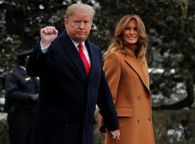 US President Donald Trump and first lady Melania Trump depart the White House on February 1, 2019, amid Washington DC's frosty temperatures. Reuters