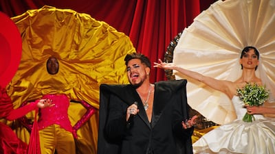 Adam Lambert, singer for the band Queen, at the Harris Reed show. He sang 'Who Wants to Live Forever'. Getty Images
