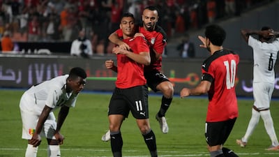 Egypt's players celebrate after scoring their goal against Guinea during their soccer match in Group D 2023 Cup of Nations (AFCON) qualifiers at Cairo International stadium in Cairo, Egypt. Egypt won 1-0. AP Photo