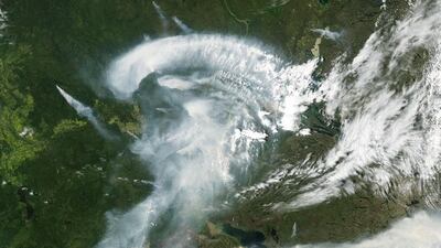Z, what begins with Z? Zambia and Zimbabwe. Zenith and zooplankton. Zillions of smoke particles zipping, zooming, and zigzagging above Canada! On July 11, 2012, the Moderate Resolution Imaging Spectroradiometer on NASA’s Aqua satellite captured this image of wildfire smoke over Canada. Courtesy NASA