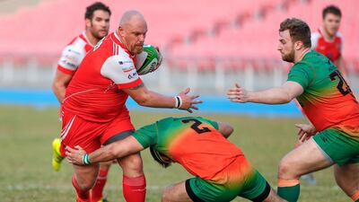 Dubai Knights Eagles take on Dubai Tigers, in red, in the West Asia Premiership at Dubai Sports City on Friday. The Tigers won 27-16.