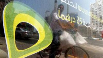 The UAE-based Etisalat reports a 1 per cent decline in quarterly profits, the third drop in a row. The National.