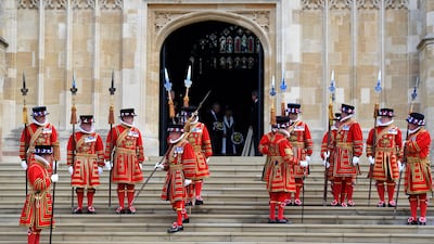 Royal guards outside St George's Chapel. EPA