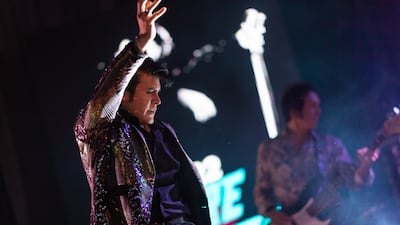 Elvis tribute artist Taylor Rodriguez performs during a show at the Parkes Leagues Club in Parkes, Australia. Getty Images