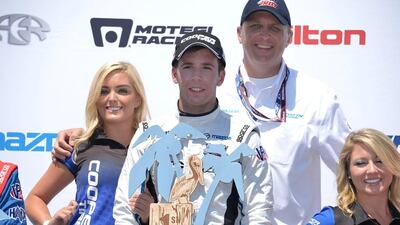 Ed Jones poses with the first-place trophy on top of the podium on Sunday, March 28. Photo courtesy: Road to Indy