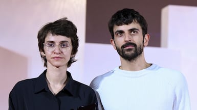 Israeli directors Rachel Szor, left, and Yuval Abraham with their Special Jury Prize for Naza, at the Venice International Film Festival. EPA