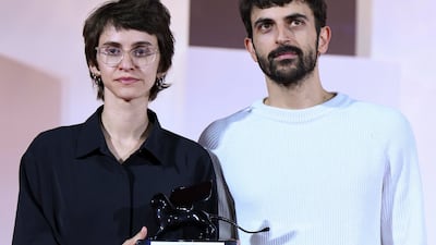 Israeli directors Rachel Szor, left, and Yuval Abraham with their Special Jury Prize for Naza, at the Venice International Film Festival. EPA