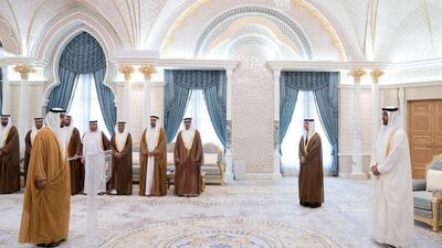 Major General Faris Khalaf Al Mazrouei, Commander-in-Chief of Abu Dhabi Police and Abu Dhabi Executive Council Member (L), gives his oath during a swearing-in ceremony for new members of the Abu Dhabi Executive Council, at the Presidential Palace. Witnessed by Sheikh Mohamed bin Zayed, Crown Prince of Abu Dhabi and Deputy Supreme Commander of the UAE Armed Forces (R) Sheikh Hazza bin Zayed, Vice Chairman of the Abu Dhabi Executive Council (back 2nd R) Sheikh Hamed bin Zayed, Chairman of the Crown Prince Court of Abu Dhabi and Abu Dhabi Executive Council Member (3rd R) Sheikh Diab bin Zayed (4th R) Jassem Mohamed Bu Ataba Al Zaabi, Chairman of Abu Dhabi Executive Office and Abu Dhabi Executive Council Member (4th R) Dr Ahmed Mubarak Al Mazrouei, Secretary General of the Abu Dhabi Executive Council (5th R) Sheikh Abdulla bin Mohamed Al Hamed, Chairman of the Health Department and Abu Dhabi Executive Council Member (6th R) Saif Mohamed Al Hajeri, Chairman of Department of Economic Development, and Abu Dhabi Executive Council Member (7th R) and Mohamed Khalifa Al Mubarak, Chairman of the Department of Culture and Tourism and Abu Dhabi Executive Council Member (back L). Mohamed Al Hammadi / Ministry of Presidential Affairs