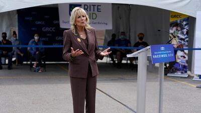 Jill Biden, in a coordinated brown suit, speaks in Grand Rapids, Michigan on May 27, 2021. AFP
