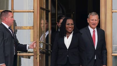 Ms Brown Jackson and Mr Roberts after her formal investiture ceremony at the Supreme Court in Washington. AP