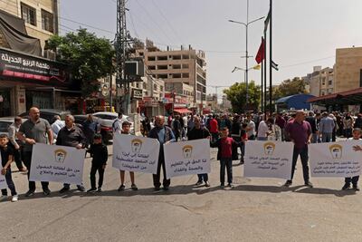 Staff of the UN agency for Palestinian refugees protest at the Dheisheh refugee camp during the strike. AFP