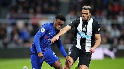 Joelinton challenges Callum Hudson-Odoi of Chelsea during the Premier League match at St. James' Park in January. Getty