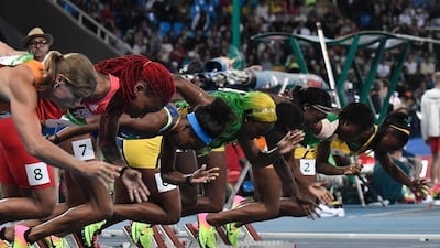 (R-L)Jamaica’s Christania Williams, Ivory Coast’s Marie-Josee Ta Lou, Jamaica’s Elaine Thompson, USA’s Tori Bowie, Jamaica’s Shelly-Ann Fraser-Pryce, USA’s English Gardner, Trinidad and Tobago’s Michelle-Lee Ahye and Netherlands’ Dafne Schippers start in the women’s 100m final during the athletics at the Rio 2016 Olympic Games at the Olympic Stadium in Rio de Janeiro on August 13, 2016. Jeff Pachoud / AFP