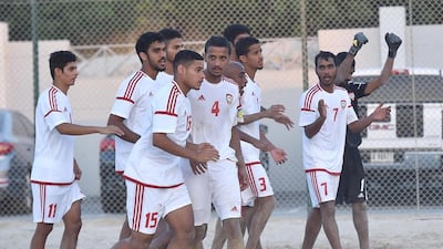 The UAE beach soccer team celebrate a warm-up win over Russia ahead of the Beach Soccer Intercontinental Cup. Photo Courtesy / UAE FA