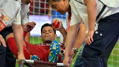 Shanghai SIPG striker Hulk is carried off on a stretcher after a knee injury picked up in the 5-0 rout of Henan Jianye. AFP
