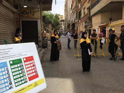 The scene in Bourj al Barajneh, southern Beirut, as Hezbollah volunteers wait to assist voters.