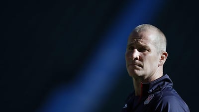 England coach Stuart Lancaster observes his side's training session on Friday for their Rugby World Cup pool play match on Saturday against Wales. Adrian Dennis / AFP