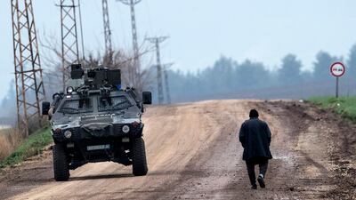 Turkish soldiers patrol near Syrian-Turkish border at Hatay, Turkey. Sedat Suna/EPA