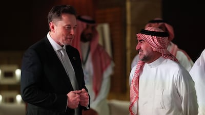 Elon Musk and Yasir bin Othman Al Rumayyan, governor of the Public Investment Fund of Saudi Arabia, view an exhibit in Saudi Arabia's old district of Diriyah. Getty Images