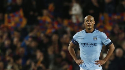 Vincent Kompany of Manchester City reacts during Wednesday night's loss to Barcelona in the Champions League. Carl Recine / Reuters