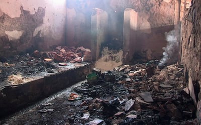 Fire damage at the prison in Gitega, Burundi. Thirty-eight prisoners were reported to have died in the blaze. AP