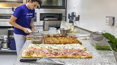 Pre-coronavirus, once the doors opened, it was a blur of cooking and serving. Photo by Grace Guino