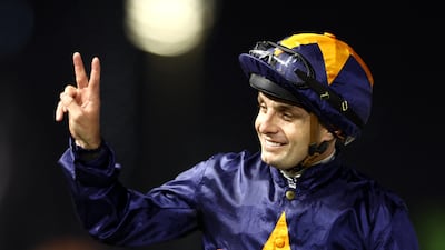 Connor Beasley celebrates his second victory of the night after riding Dark Saffron to glory in the Dubai Golden Shaheen. Reuters