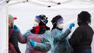 The US hit its highest-ever daily average for new Covid-19 cases as Omicron continues to surge through the country. EPA