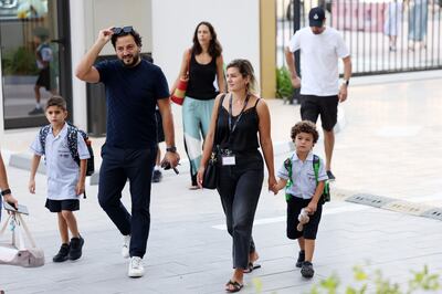 Parents leave their children at Dubai British School Jumeira on the first day of the new academic year. Chris Whiteoak / The National