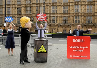 A Leave campaigner, right, stands next to Remain campaigners in Westminster. Matt Dunham / AP