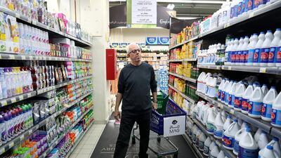 Abu Dhabi, United Arab Emirates - December 30th, 2017: Nabil Nasser shops in Abu Dhabi before VAT starts in the new year. Chris Whiteoak / The National
