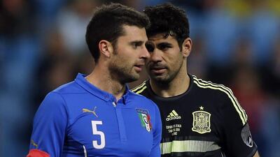 Thiago Motta and Italy lost to Spain 1-0. They'll play in Group D at the 2014 World Cup with Uruguay, Costa Rica and England. Andres Kudacki / AP