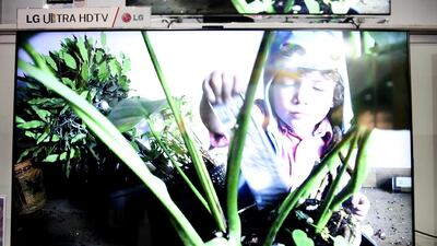 A 65-inch Samsung flat screen TV, which sells for Dh158,999, comes with a raffle for a BMW. Lee Hoagland / The National