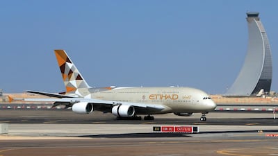 An Etihad Airbus A380 lands at Abu Dhabi International Airport. Ravindranath K / The National