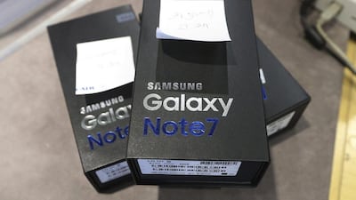 Returned boxes of Samsung's Galaxy Note 7 smartphones are placed at a shop of South Korean mobile carrier in Seoul. Lee Jin-man / AP Photo