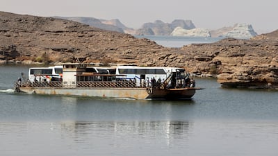 Sudan evacuees cross the Nile on a ferry taking them to Abu Simbel city, Egypt. Reuters
