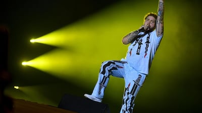 US singer, rapper, songwriter and producer Post Malone performs on stage at the Sziget Island Festival in Hajogyar Island, Budapest on August 11, 2019. AFP