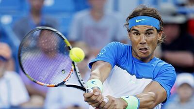 Rafael Nadal is continuing to struggle this season but Roger Federer and Andy Murray both back the Spaniard to battle his way through it all. John Minchillo / AP Photo