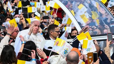 Pope Francis blesses worshippers at Saint Publius church in Floriana, near Valletta, on Sunday as part of his official trip to Malta. AFP