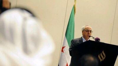 Head of the Syrian National Council (SNC) and Syrian opposition chief Abdel Basit Sayda speaks during a news conference in Abu Dhabi early on Sunday. REUTERS/Ben Job