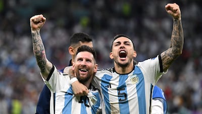 Lionel Messi and Leandro Paredes celebrate after Argentina defeated the Netherlands in the penalty shoot-out in their World Cup quarter-final at the Lusail Stadium, on December 9, 2022. Getty