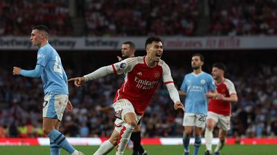 Arsenal's Gabriel Martinelli celebrates after scoring the opening goal against Manchester City at the Emirates Stadium. AFP