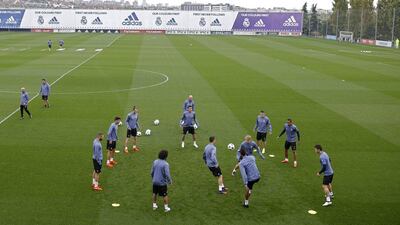 Real Madrid players work out during training. Francisco Seco / AP Photo