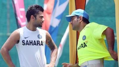 The onus on leading India's batting rests largely on the shoulders of Virat Kohli, left, and his captain MS Dhoni. Lakruwan Wanniarachchi / AFP