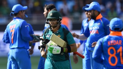 Pakistan batsman Imam-ul-Haq leaves the field after being dismissed by India during an Asia Cup group game at the Dubai International Cricket Stadium. AFP