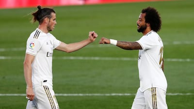 Marcelo and Gareth Bale celebrate the win. Reuters